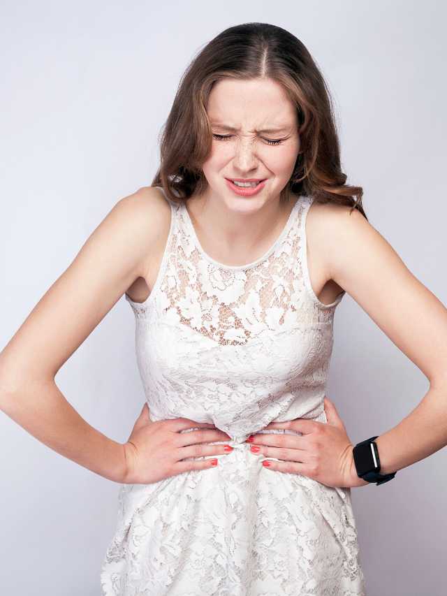 Periods Se Pehle Ke Pet Dard: Karan aur Upay