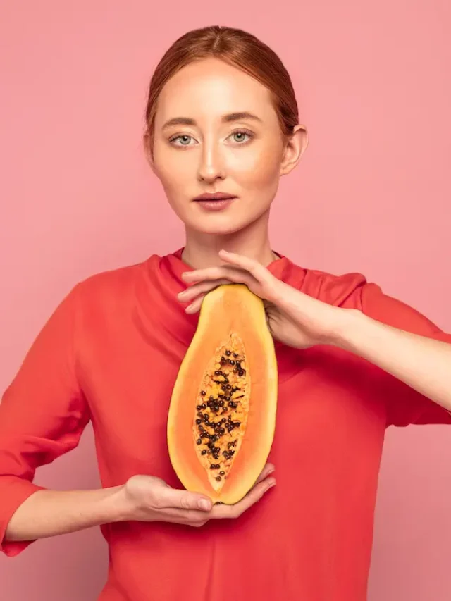 redhead-woman-holding-melon